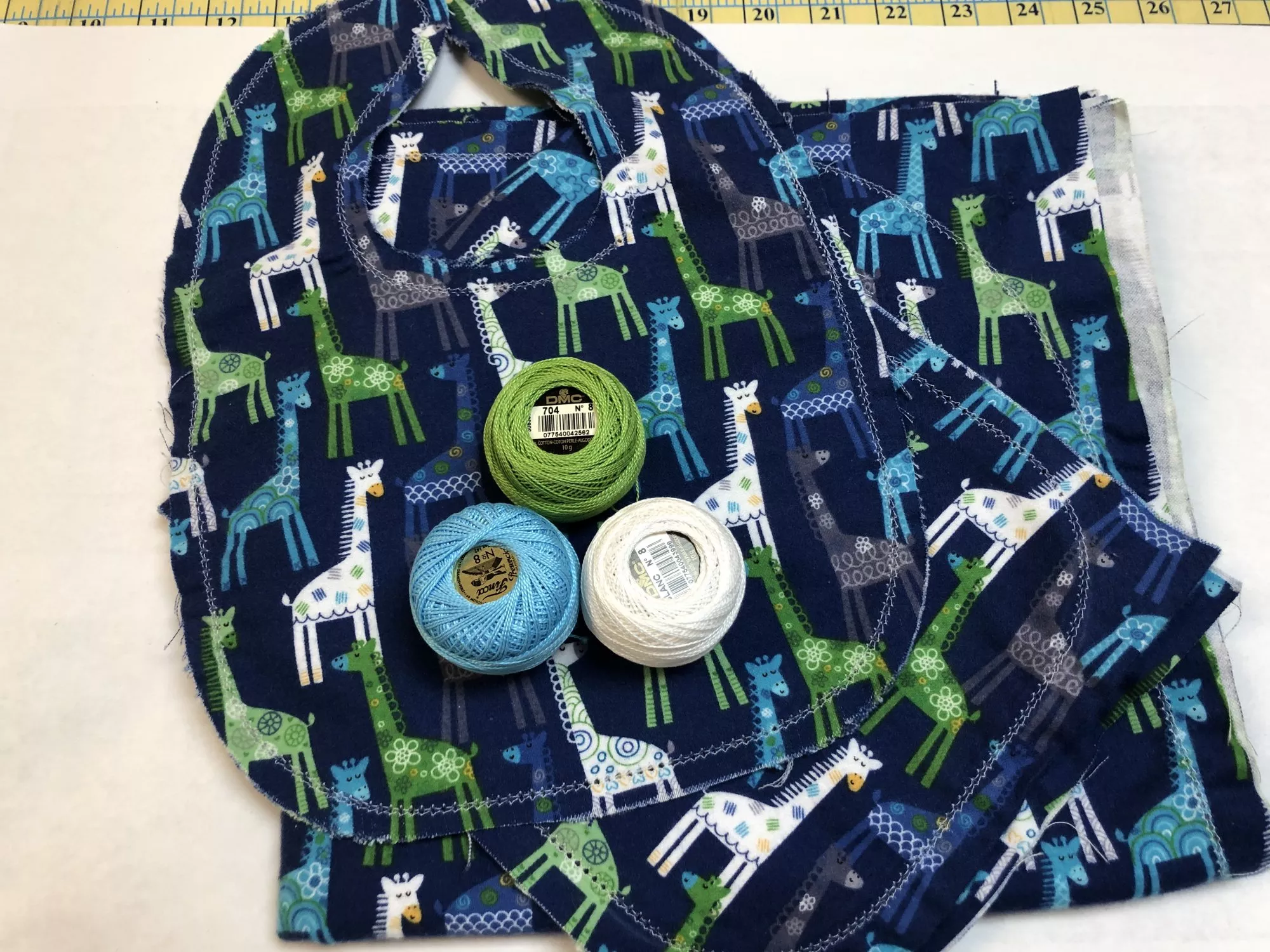 giraffes-on-blue-hemstitched-flannel Giraffes on Blue Hemstitched Flannel