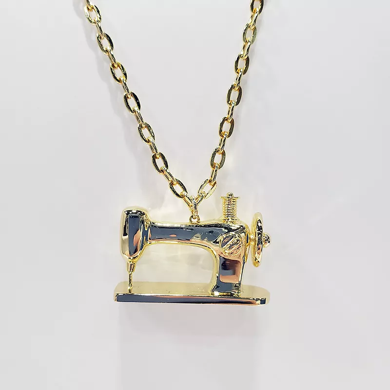 pendant-sewing-machine-gold Pendant Sewing Machine Gold