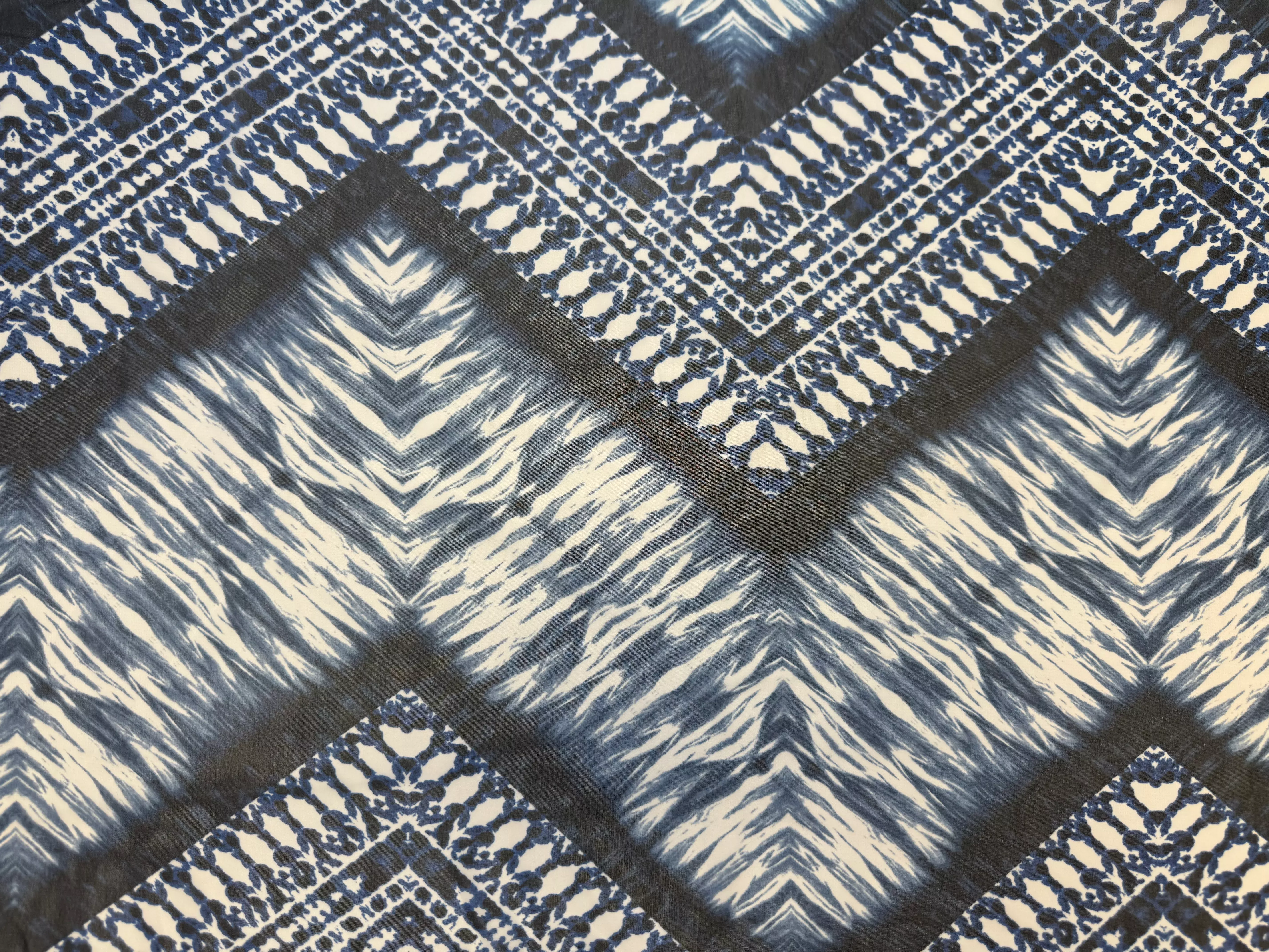 white-with-blue-geometric-patterns-chiffon White with blue geometric patterns | Chiffon